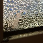 Reflection of the sunlight through a dew window