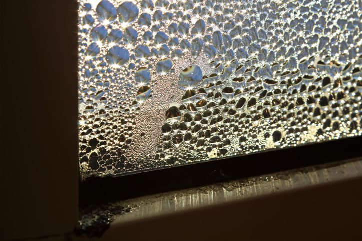 Reflection of the sunlight through a dew window