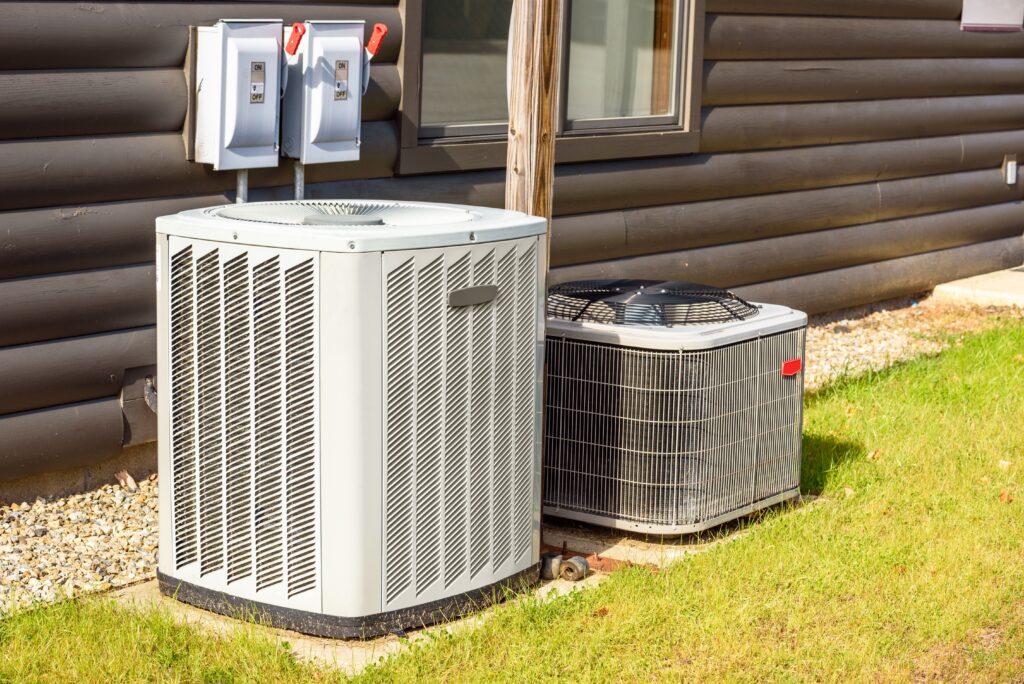 Heating,And,Air,Conditioning,System,External,Units,On,Grass,In